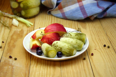 Cucumbers with apples pickled for winter