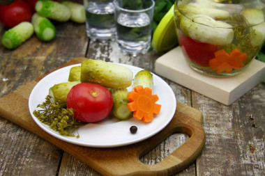 Pickled cucumbers with tomatoes for winter. Assorted vegetables