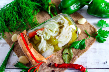 Crispy pickled cabbage in a jar for winter