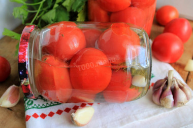 Pickled tomatoes in liter jars for winter