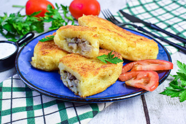 Potato zrazy with mushrooms in a frying pan