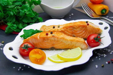 Fried red fish in a frying pan