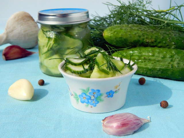 Cucumber salad for winter with garlic, dill and herbs