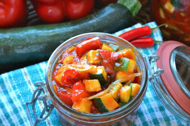 Zucchini in tomato paste with butter on winter