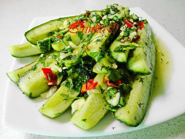 Pickled cucumbers in a container