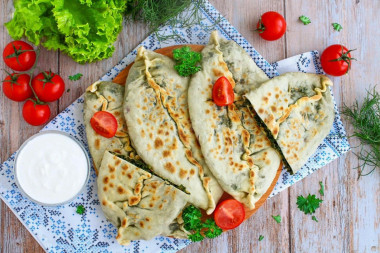 Tortillas with herbs in a frying pan