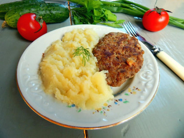 Minced pork beef patties juicy in a frying pan