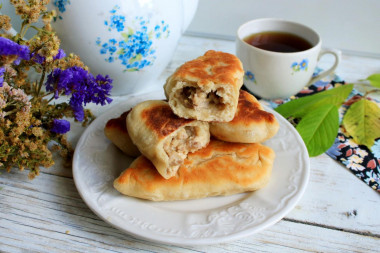 Meat pies fried in a pan