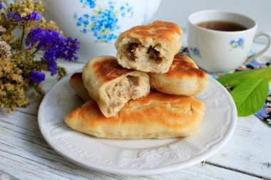 Meat pies fried in a pan