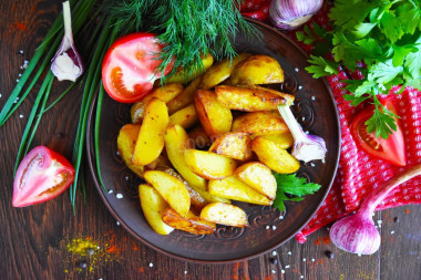 Rustic fried potatoes in a frying pan