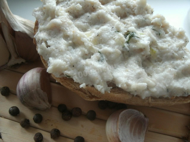 Lard with garlic through a meat grinder