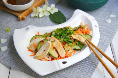 Korean salad with cucumbers and chicken