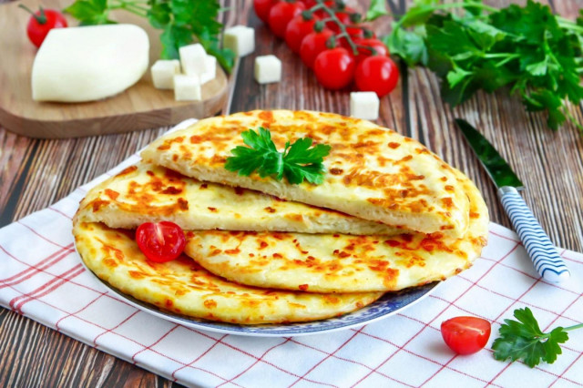 Quick khachapuri with cheese in a pan