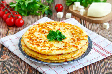 Quick khachapuri with cheese in a pan