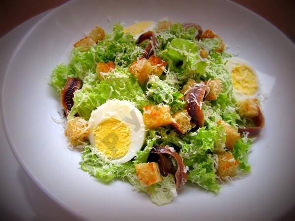 Salad with anchovies and egg