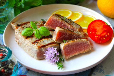 Tuna steak fried in a frying pan