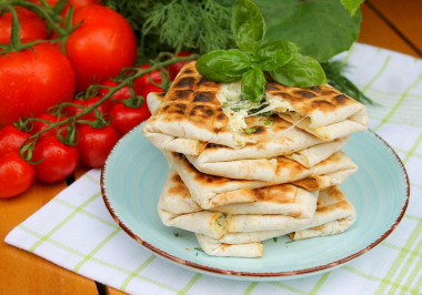 Lavash on the grill with cheese