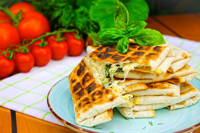 Lavash on the grill with cheese