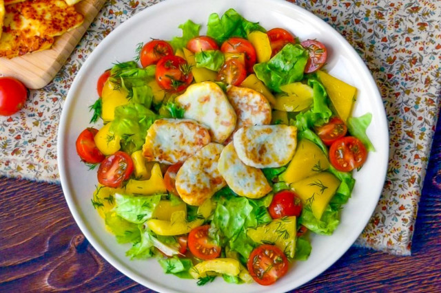 Salad with fried Adyghe cheese and tomatoes