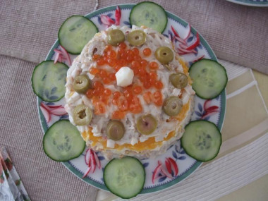 Pearl salad with caviar and salmon layers