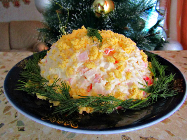 Salad with crab sticks and melted cheese