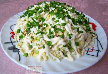 Layered salad with sprats and mayonnaise