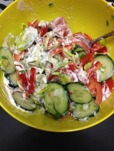 Salad of early greenhouse vegetables