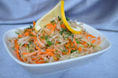 Fitness salad of green radish with carrots