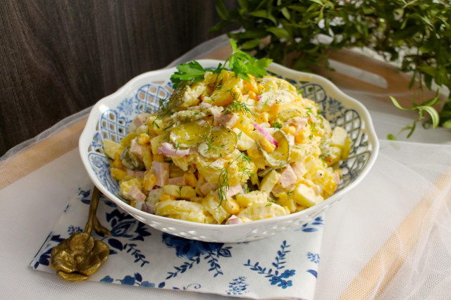 Salad with potatoes sausage and cucumber