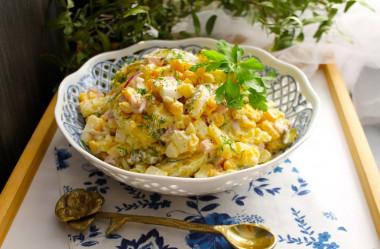 Salad with potatoes sausage and cucumber