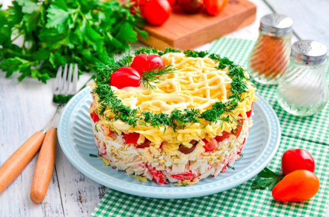 Layered salad with crab sticks