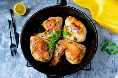 Fried chicken in a frying pan