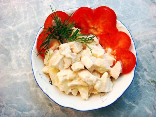 Salad with fried chicken breasts with pineapple