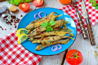 Capelin fried in a frying pan