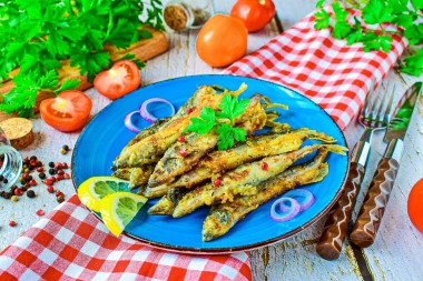 Capelin fried in a frying pan