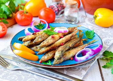 Capelin fried in a frying pan