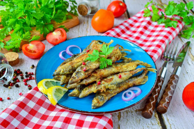 Capelin fried in a frying pan