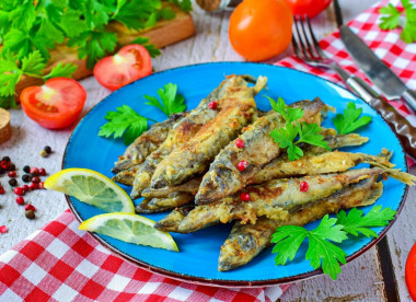 Capelin fried in a frying pan