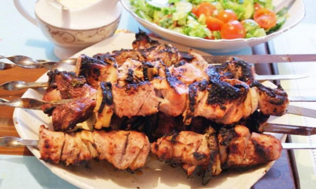 Pork kebab on kefir with coriander