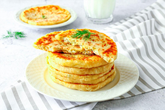 Cheese tortillas on kefir in a frying pan