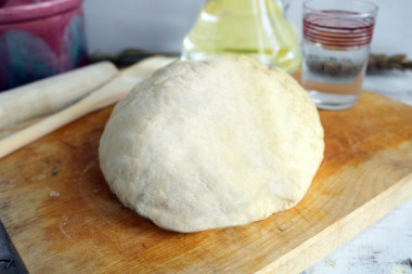 The dough for chebureks with bubbles is crispy