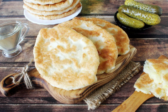 Fried pies on pan with milk