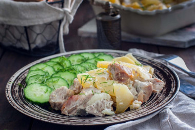 Pork in mayonnaise, baked with potatoes and onions