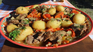 Armenian hashlama of beef on beer in a cauldron