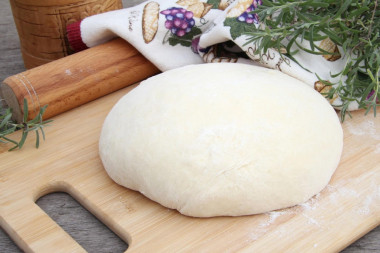 Milk dough for pies in a frying pan