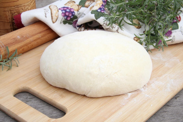 Milk dough for pies in a frying pan