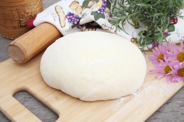 Milk dough for pies in a frying pan