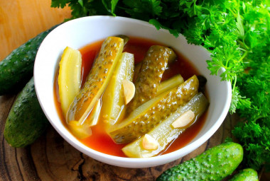 Cucumbers in tomato sauce for winter