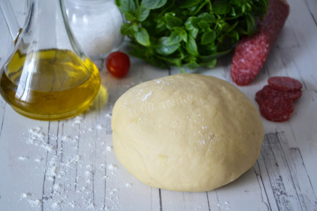 Pizza dough on boiling water