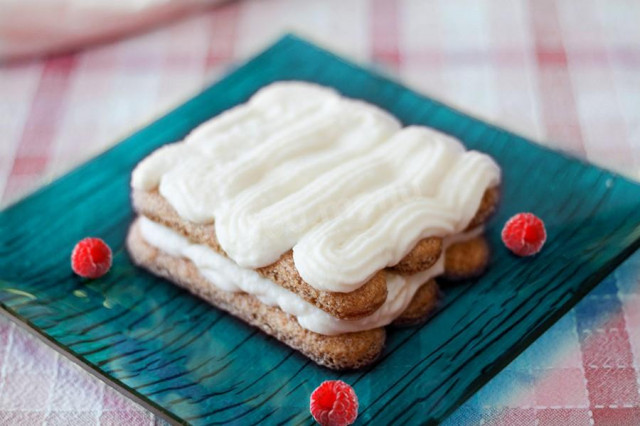 Cream for tiramisu with mascarpone with powdered sugar and cream